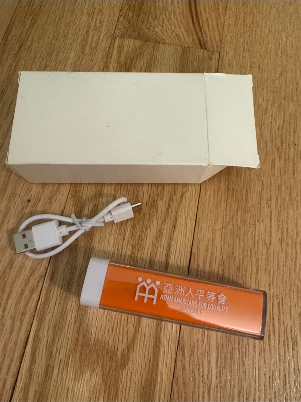 Orange Portable Power Bank with USB Cable